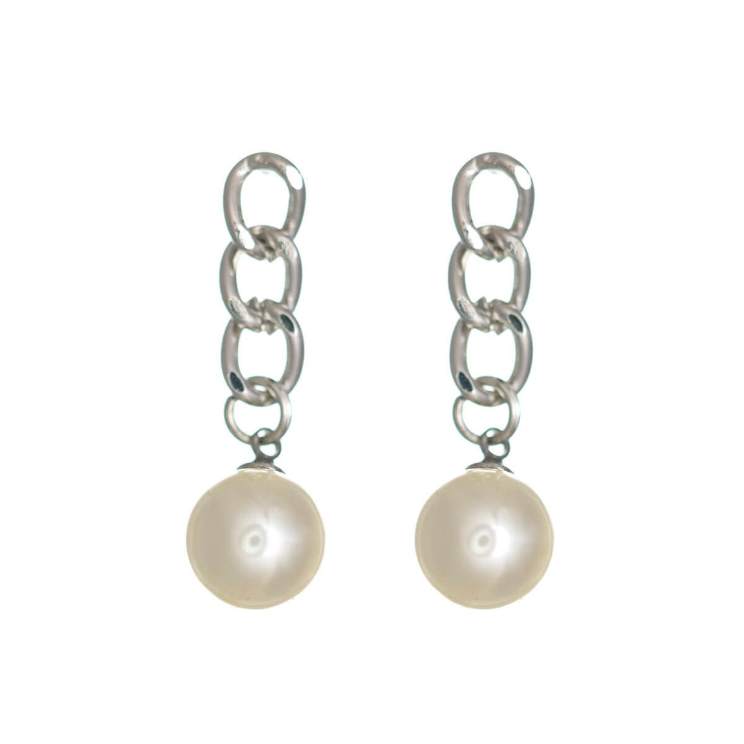 Pearl earrings hanging from a chain