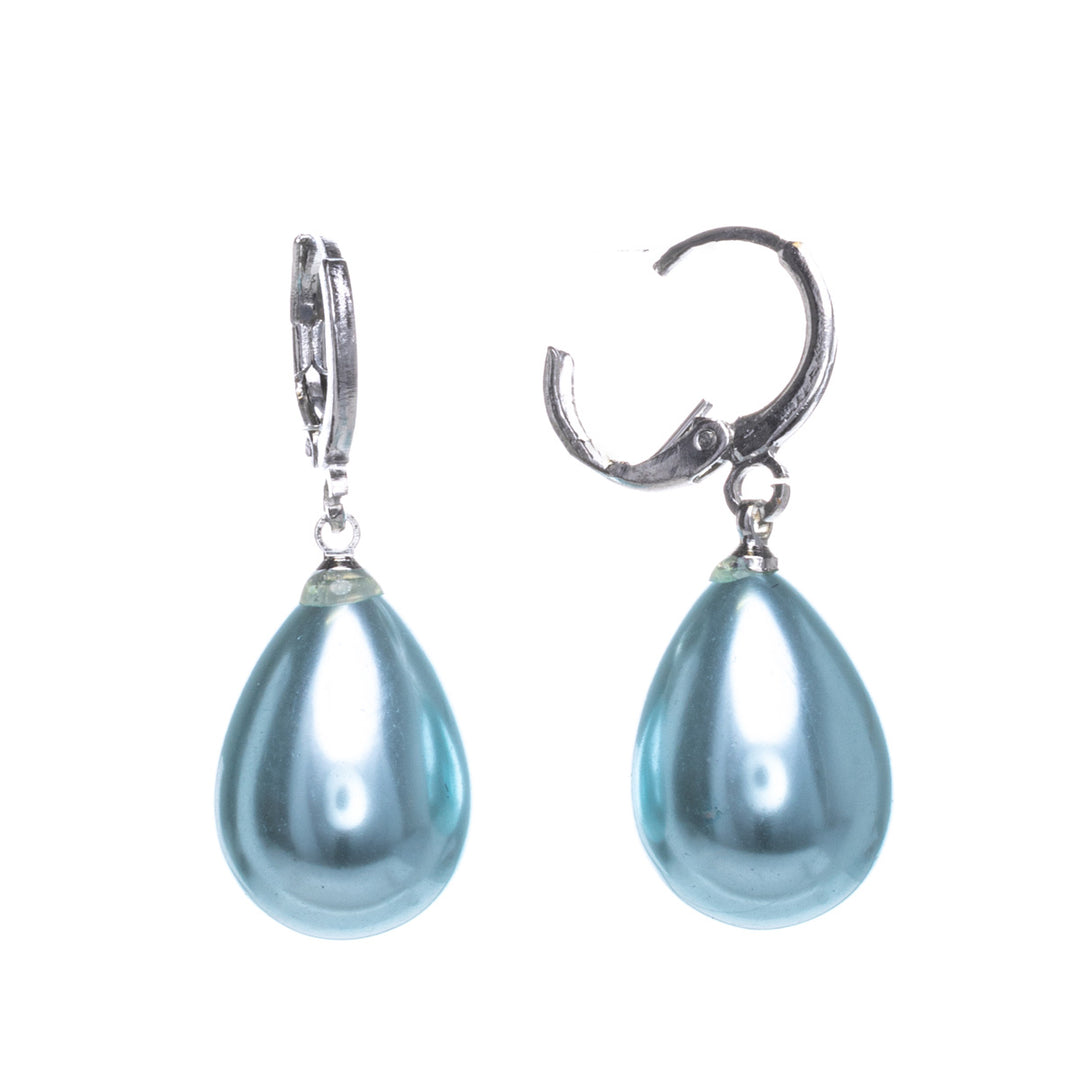 Droplet-shaped pearl earrings hanging from a ring