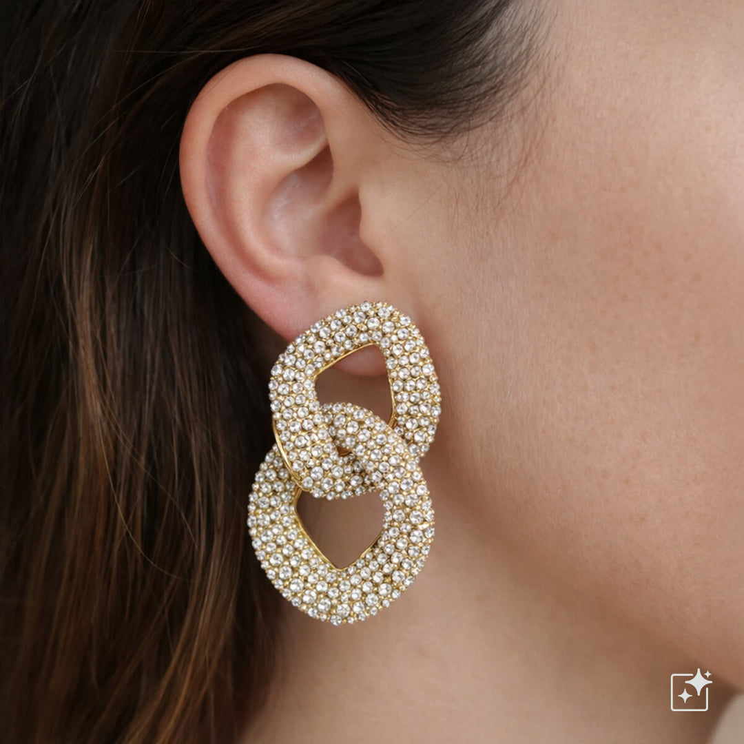 Stora glittrande kedjeörhängen med pärlor