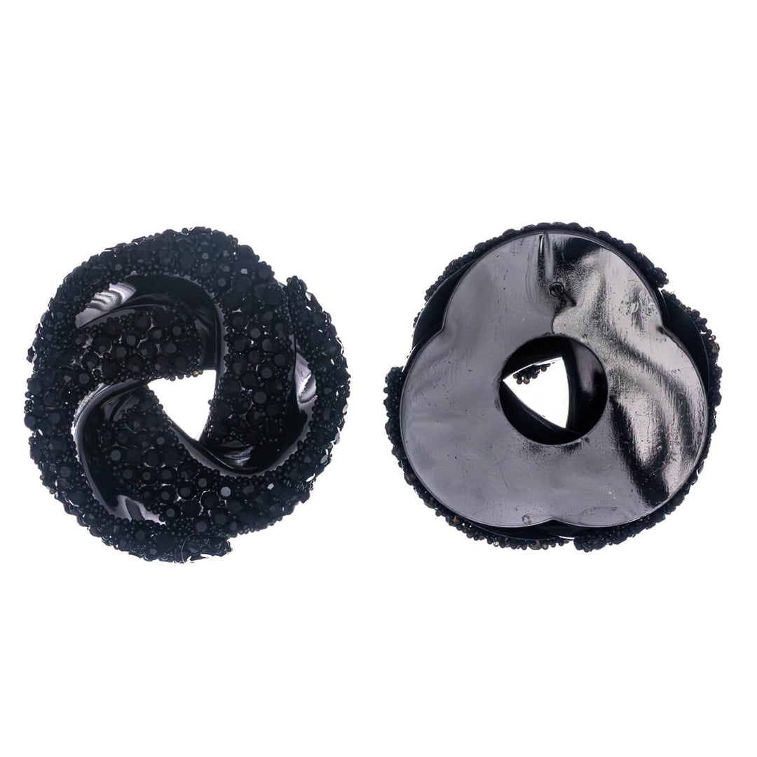 Isot kimaltavat solmu korvakorut