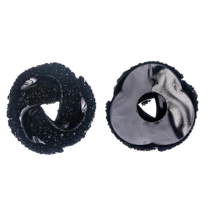 Isot kimaltavat solmu korvakorut