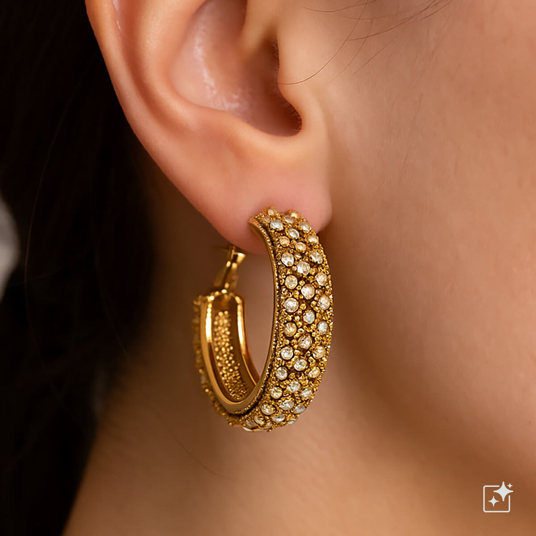 Leveät kimaltavat korvarenkaat