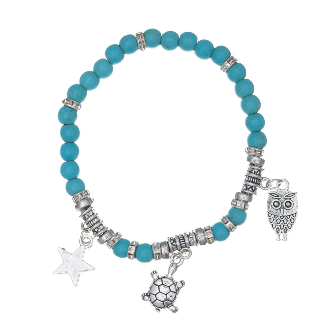 Joustava kivi rannekoru riipuksilla