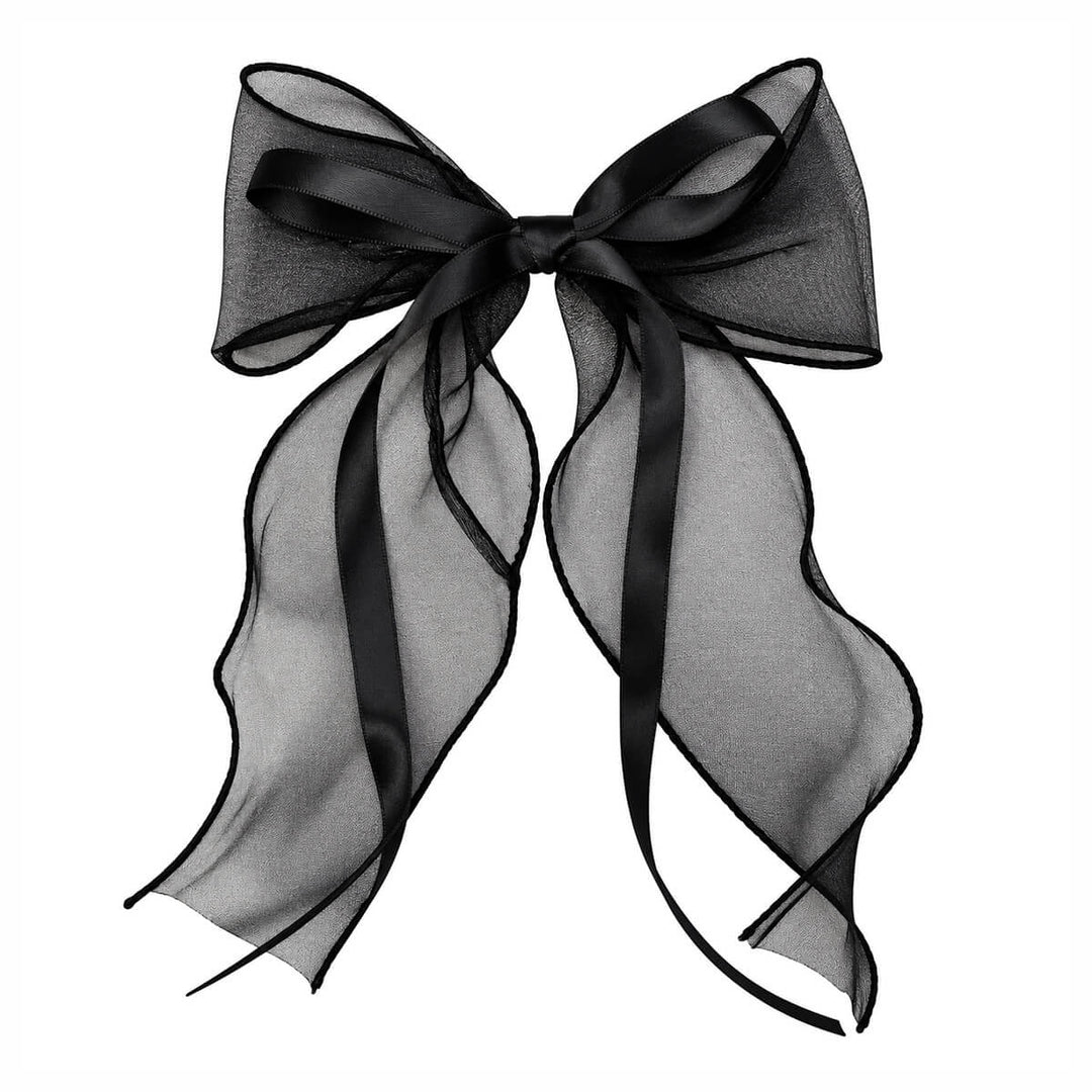 Lightweight, lace-like hair bow with a clasp