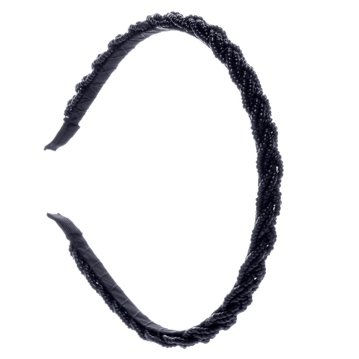 Smalt hårband flätat med pärlor