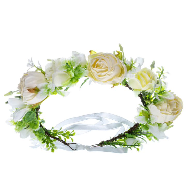 Festlig ros till blomsterkransen