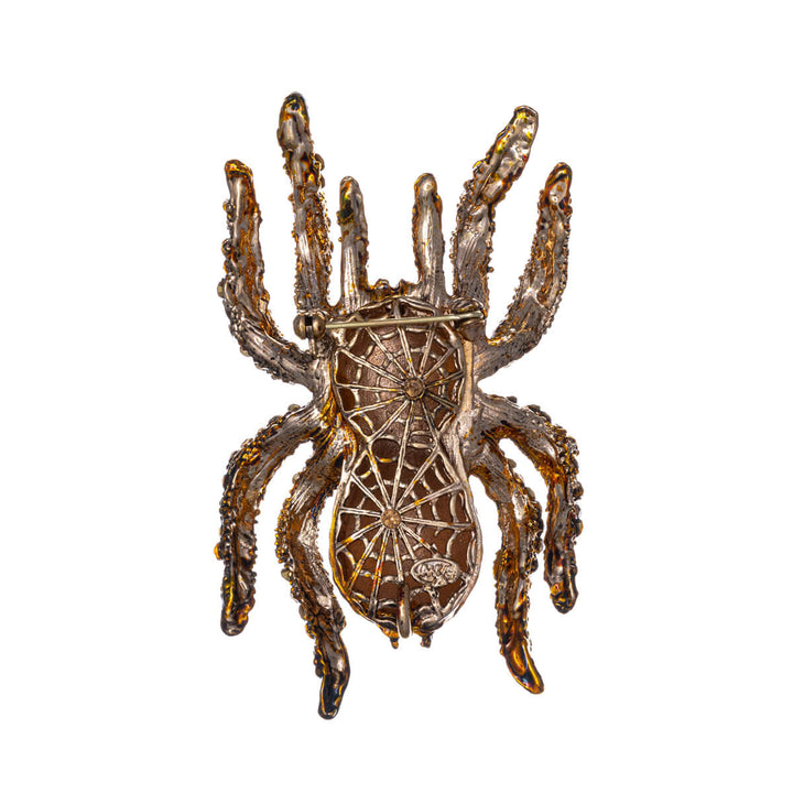 Sparkling spider brooch with glass stones